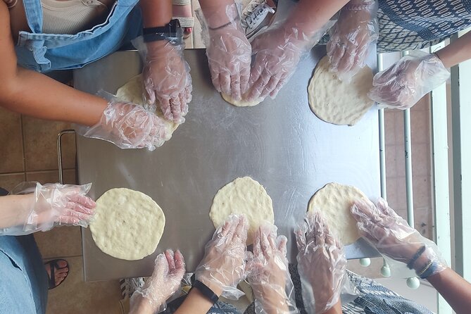 Athens Greek Cooking Class Pita Gyros from Scratch with a Local - Rolling pita bread from scratch