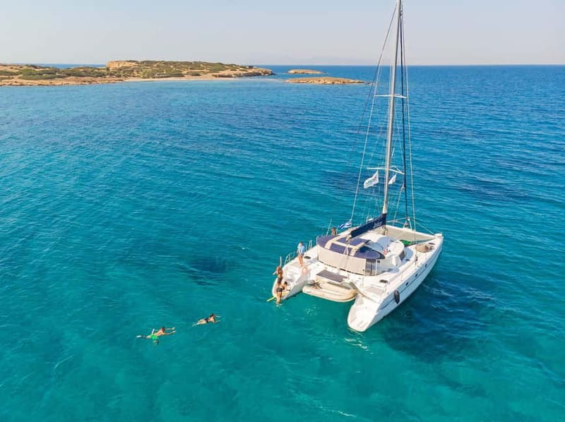 Athens: Half-Day Sunset Catamaran Cruise with Meal & Drinks - Sailing out from Athens toward the Saronic Gulf