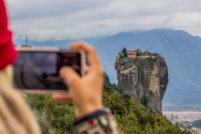 Athens: Meteora Monasteries, Caves & Coastal Stopovers with Lunch - Entering three monasteries above the cliffs