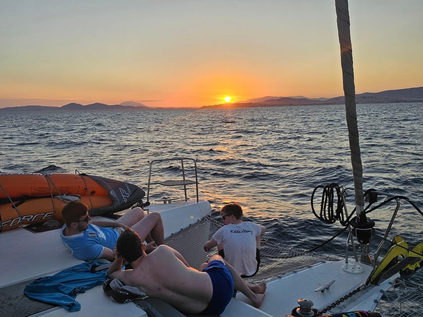 Athens: Riviera Catamaran Tour with Fresh Meal and Drinks - A seven-dish lunch cooked on the boat