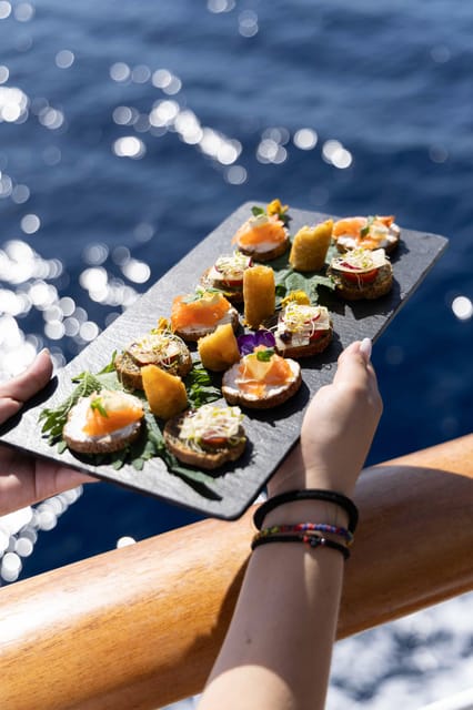 Athens: Saronic Islands Cruise with VIP Area Seating & Lunch - The return trip brings music and dancing