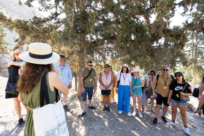 Athens Sightseeing & Acropolis With Entry Tickets Included - Ancient monuments from the bus window