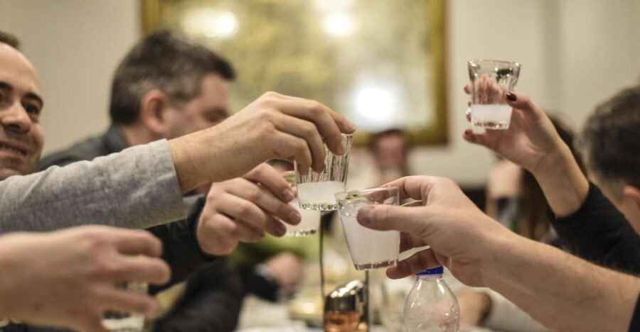 Athens: Ultimate Food Walking Tour with 15 Tastings - Cured meats, local drinks, and small-shop connections