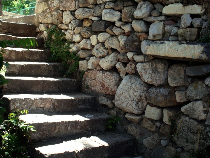 Cats of Athens: Self-Guided Mobile Tour in Plaka - Looking down toward the ancient Agora