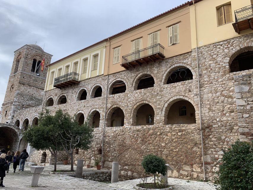 Delphi: Private Day Tour from Athens with Luxurious Vehicle - Arachova adds mountain scenery and a local pause