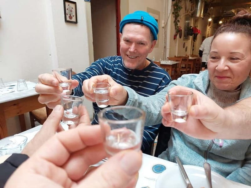 Eat Your Way Through Athens: A Local Food Walk - Stop four: cheese, sliced meats, olives, and tsipouro