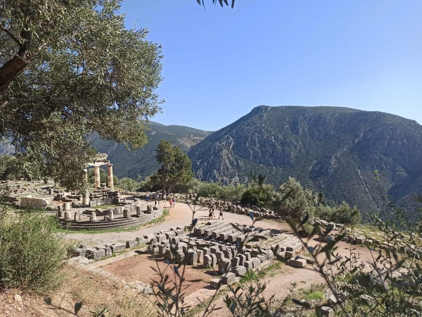 From Athens: Delphi Day Trip & Arachova Village Stop - Walking through Apollo’s sanctuary